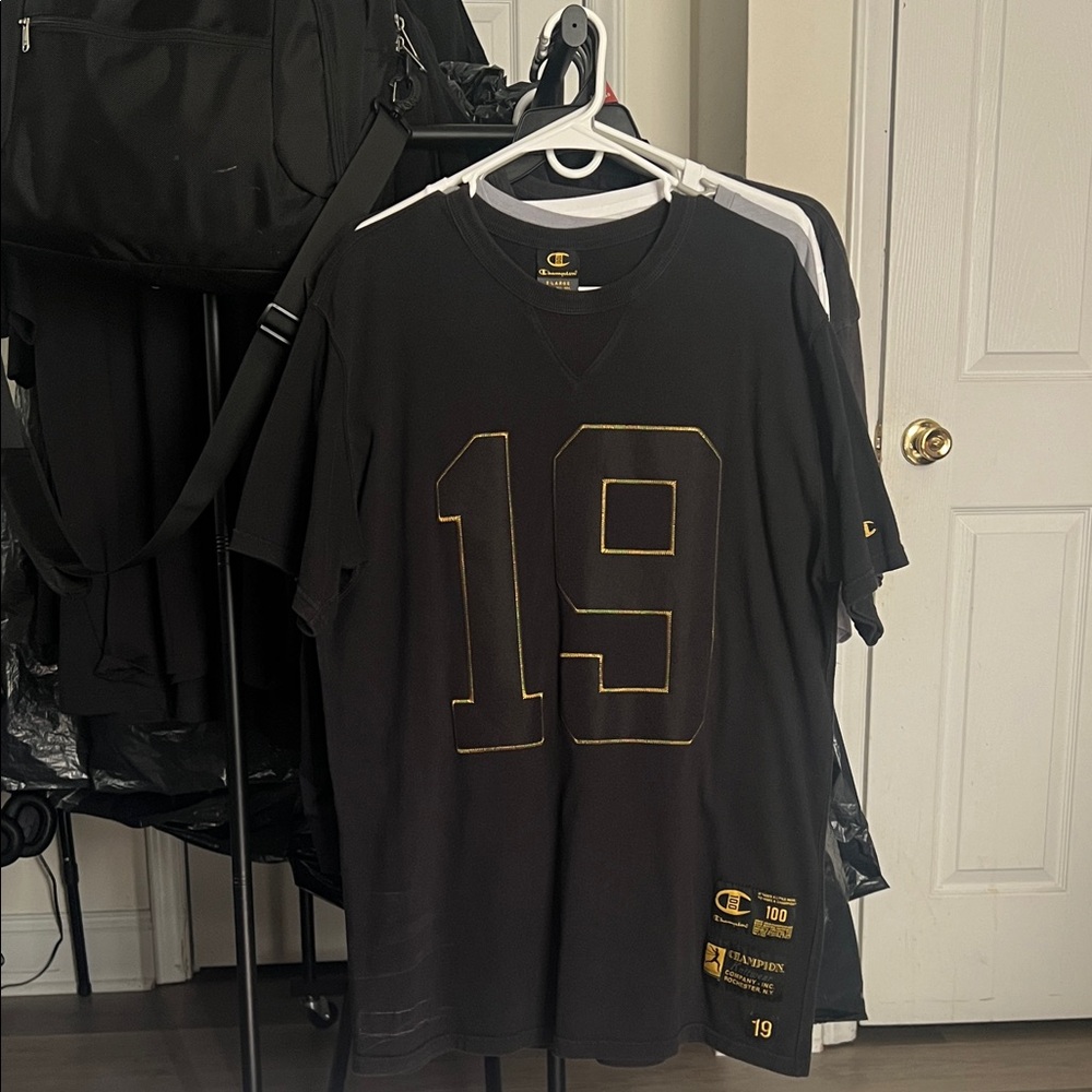 Champion Black Jersey with Gold Details